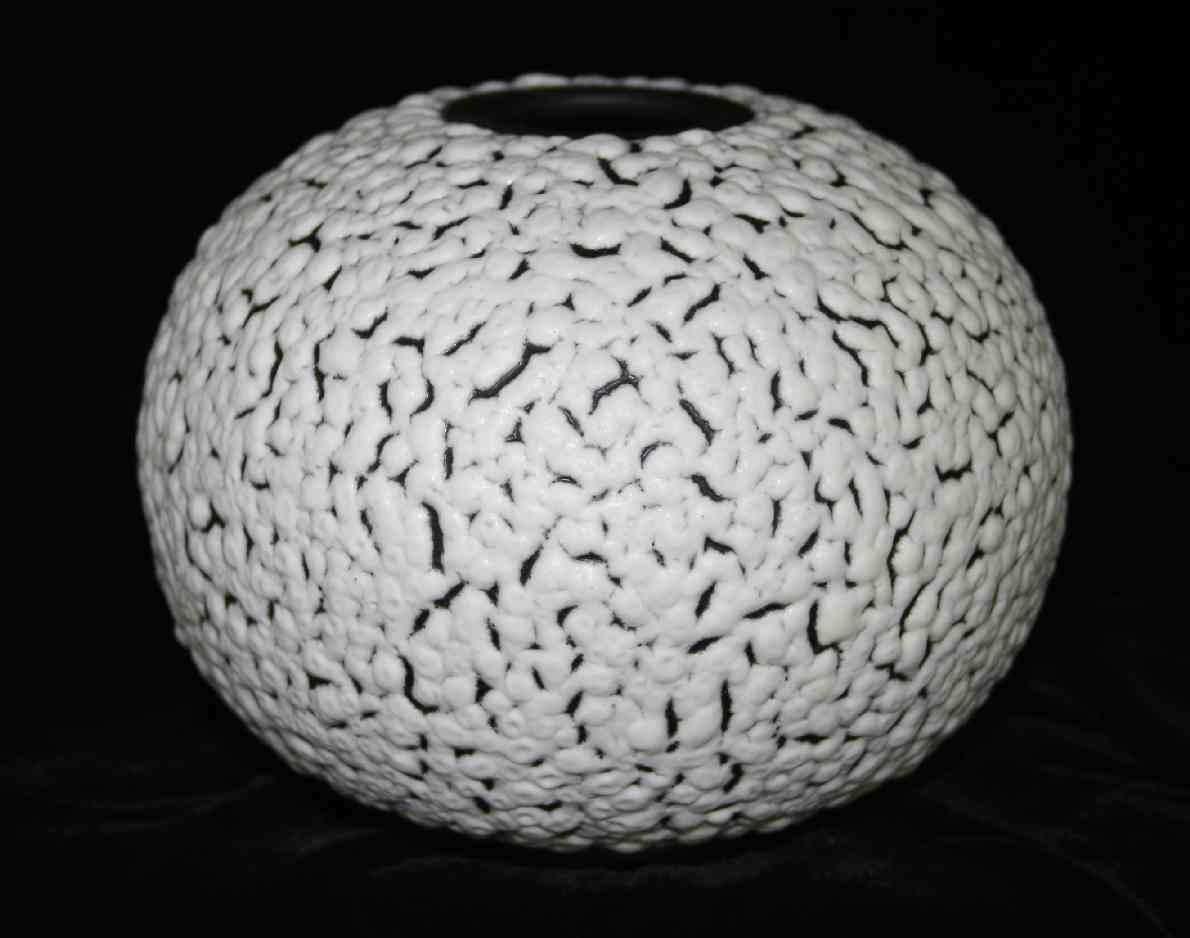 Lava sphere, white lava glaze over black slip on stoneware clay, d: 200mm